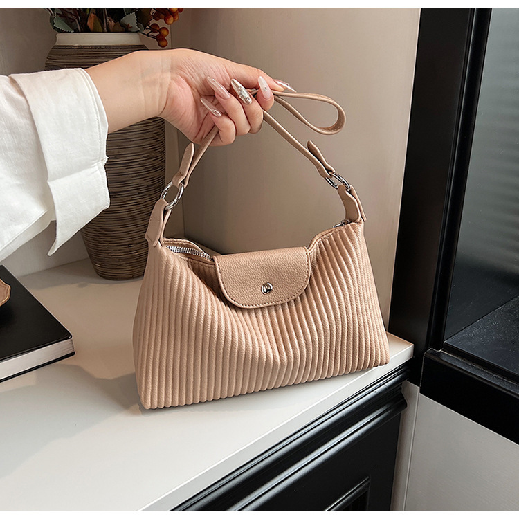 Niche design pleated striped 2024 new women's versatile and simple single shoulder pillow crossbody armpit bag_voghion.com