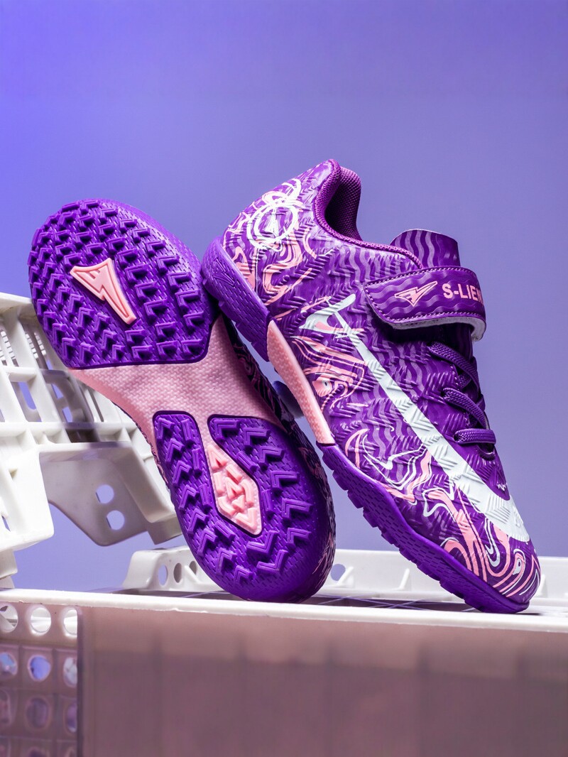 Zapatos de fútbol transfronterizos de alto perfil para hombres TF zapatos de entrenamiento antideslizante transpirables para niños zapatos deportivos profesionales para estudiantes