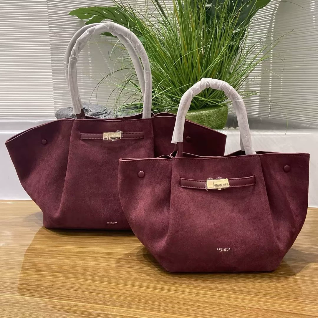 Handheld capacious purse, shoulder bag