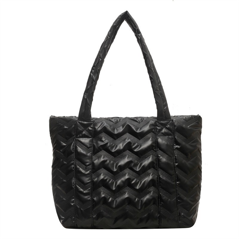 Bolso de las mujeres 2024 primavera nueva gran capacidad de algodón acolchado bolsa de asas de la moda todo-fósforo portátil de cercanías bolsa de hombro al por mayor