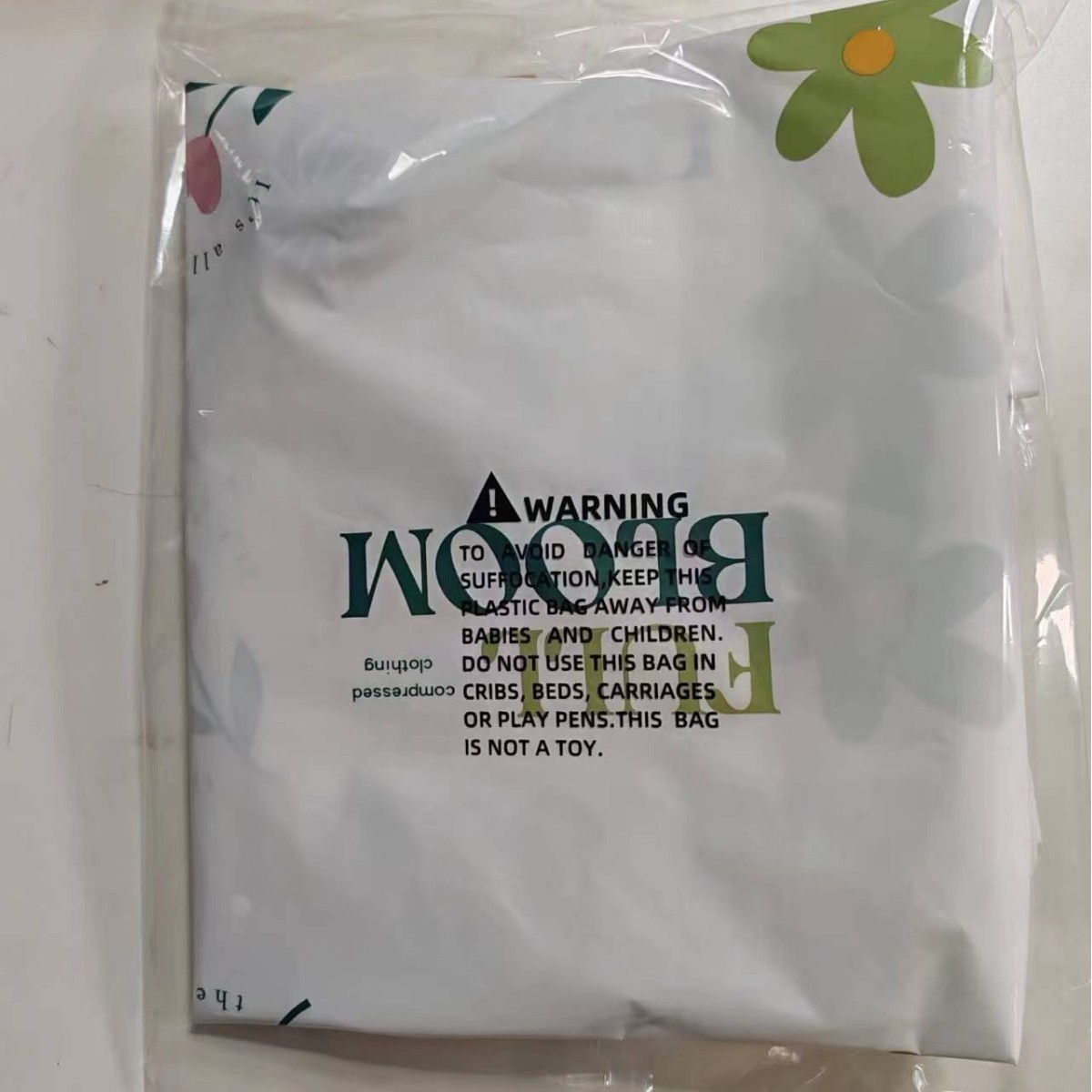 Cross-border en stock abrigo a prueba de polvo gancho a prueba de humedad bolsa de compresión de vacío chaqueta especial tirón lateral colgando bolsa de compresión