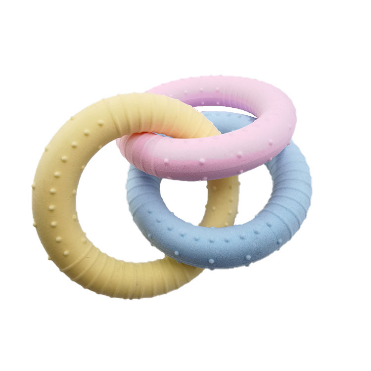 Macaron color mascota juguete TPR tres cadenas leche sabor espuma círculo perro molar mordedura de juguete de entrenamiento