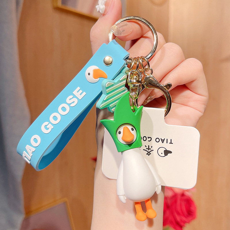 Venta directa de fábrica llavero colgante pequeño muñeca tridimensional llavero de coche mochila escolar colgante puesto al por mayor productos pequeños