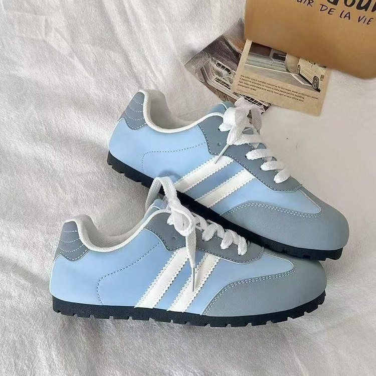 Mujeres 2026 primavera y otoño nuevo estilo de estilo de campus zapatos casuales de fondo plano de moda zapatos blancos de cabeza redonda de verano transpirables