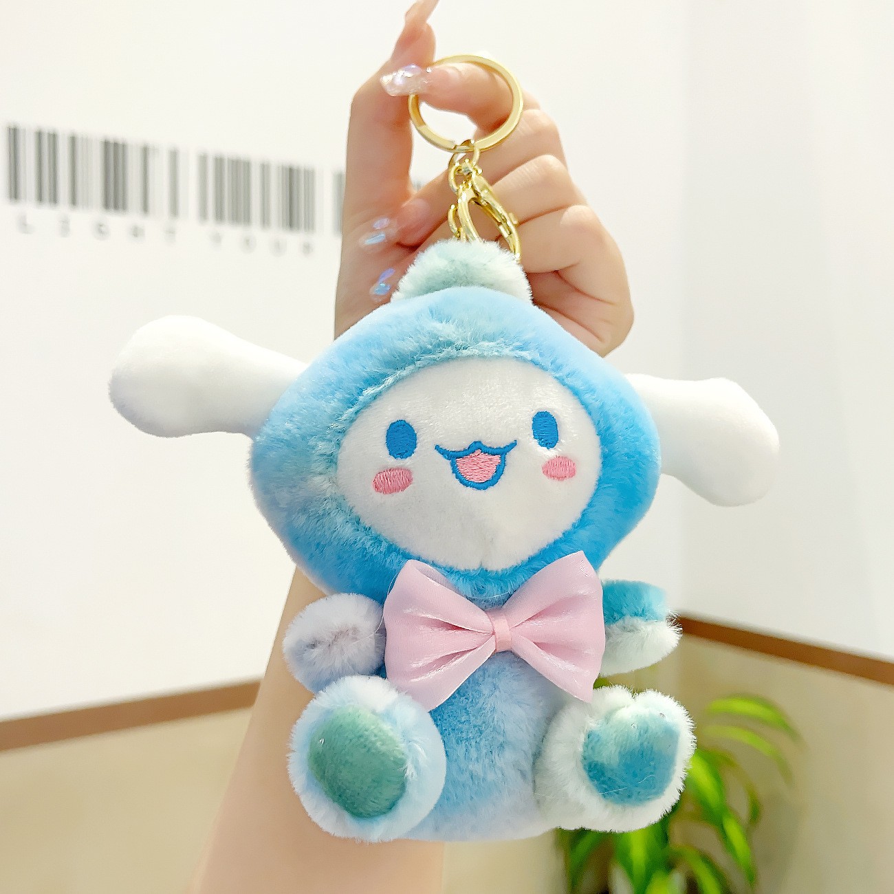 Cuatro pulgadas muñeca máquina colgante felpa llavero lindo muñeca mochila adornos grab máquina muñeca regalo al por mayor