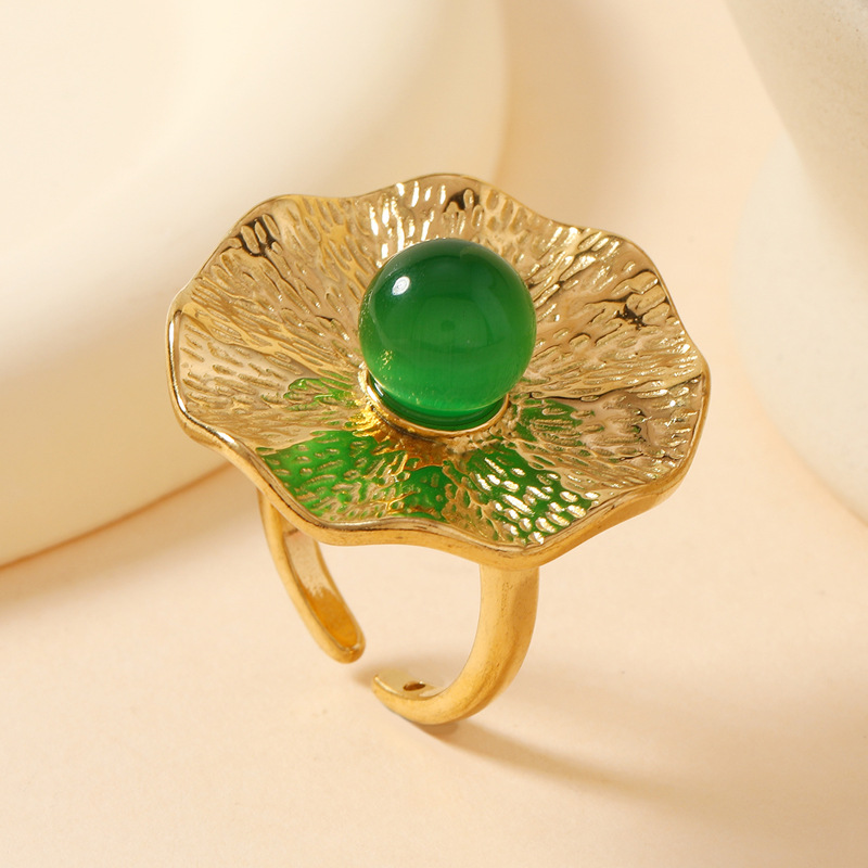 Green, flowered, with gem