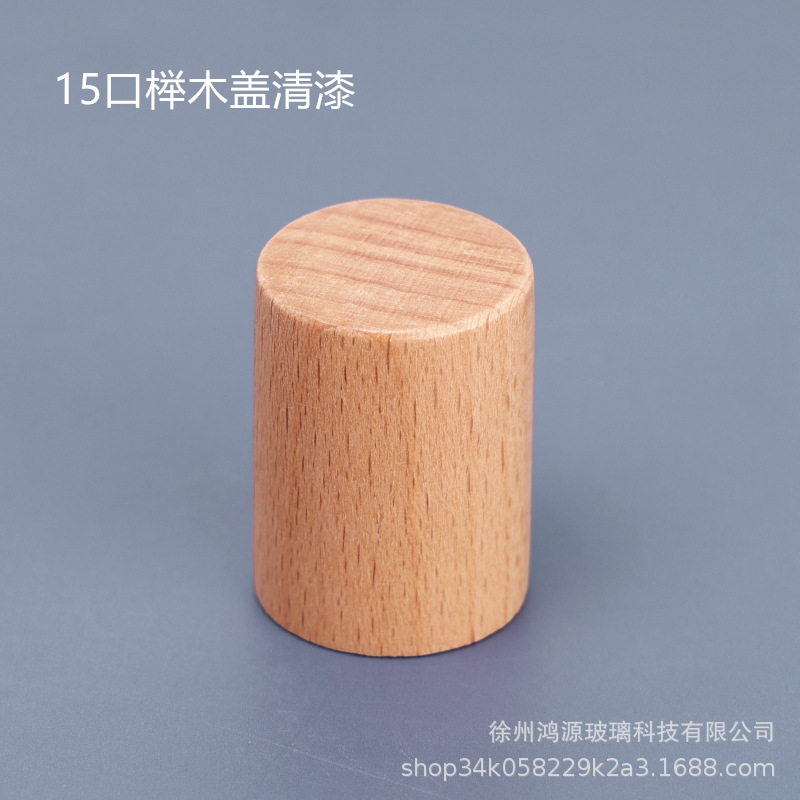 Venta al por mayor directa de fábrica en stock bayoneta botella de perfume cilíndrica multicolor cubierta de madera cosméticos cubierta de palo de rosa