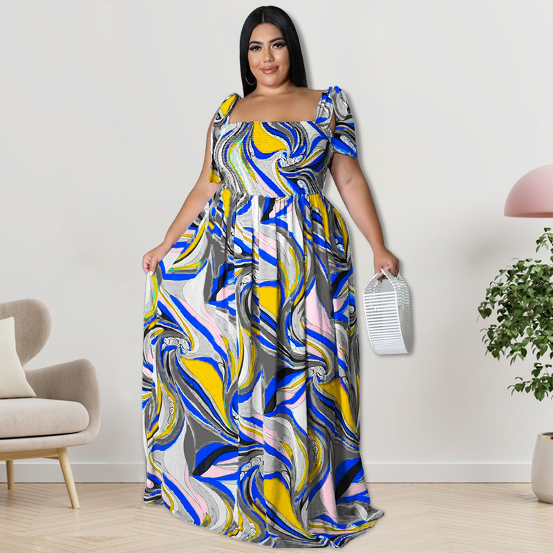 Maxi jurk met spaghettibandjes en smockwerk en strikprint_voghion.com