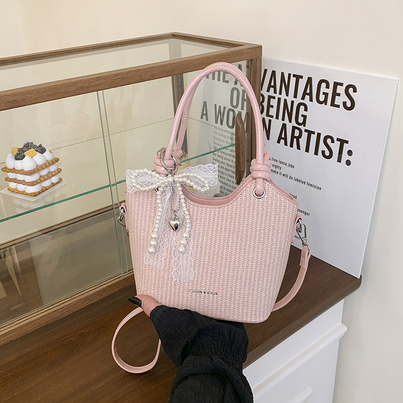 Bolsos de alta gama para mujer 2025 nuevo bolso de cubo popular moda bolso de hombro de todo fósforo bolso de mensajero de cercanías