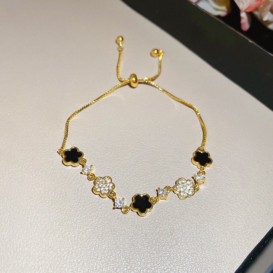 Golden black bracelet, flowered