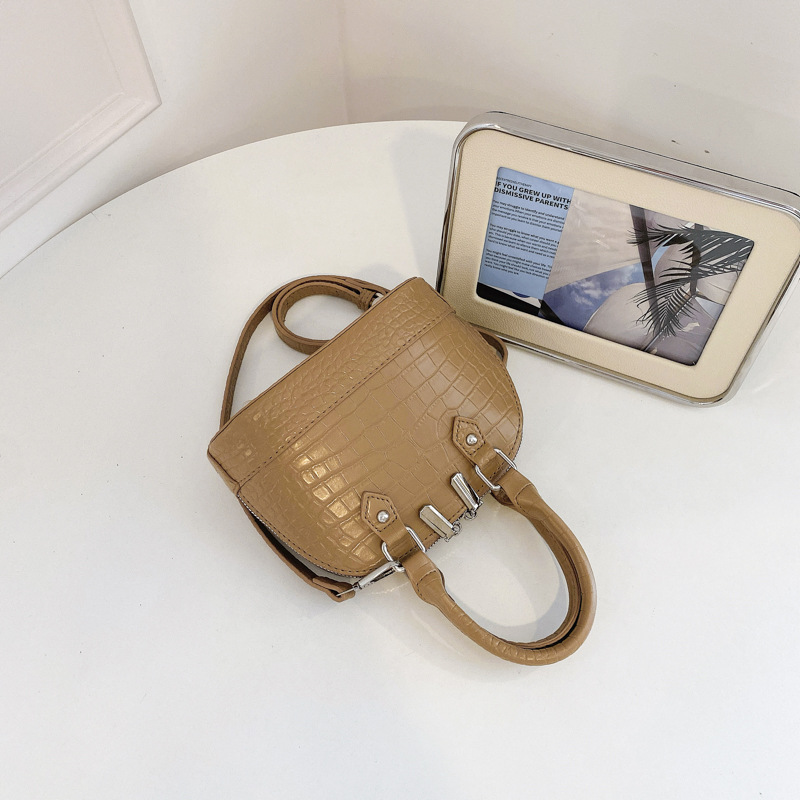 Verano estampado de piedra sensación diaria bolso de mano para mujeres 2026 nueva moda viaje bolsa de hombro bolsa de concha de tramo inclinado