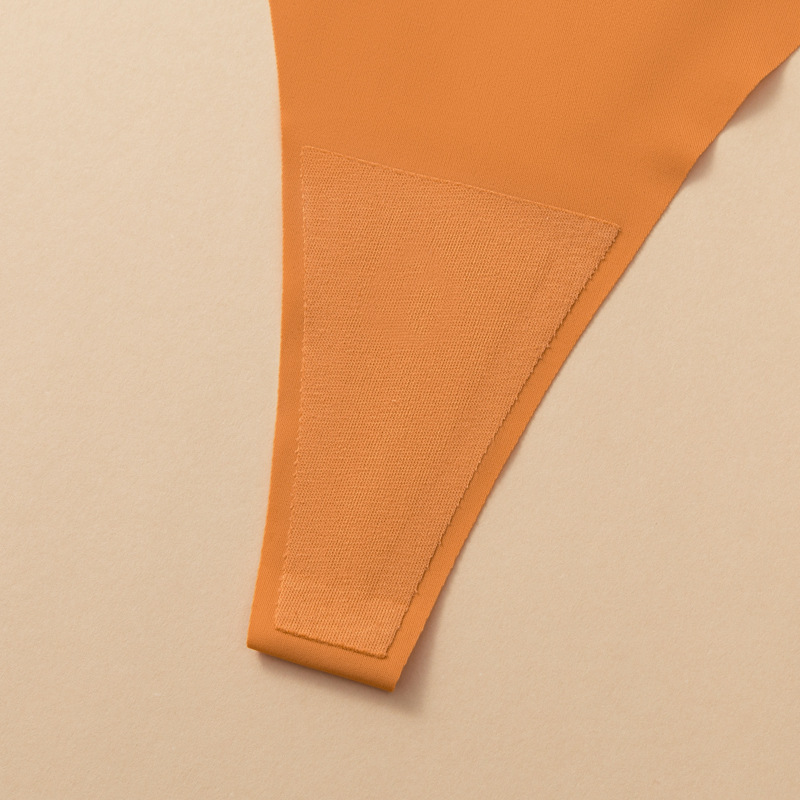 Tangas populares transfronterizas de talla europea, ropa interior sin costuras de seda helada, tanga sexy de tirantes finos para mujer de talla grande, transpirable.