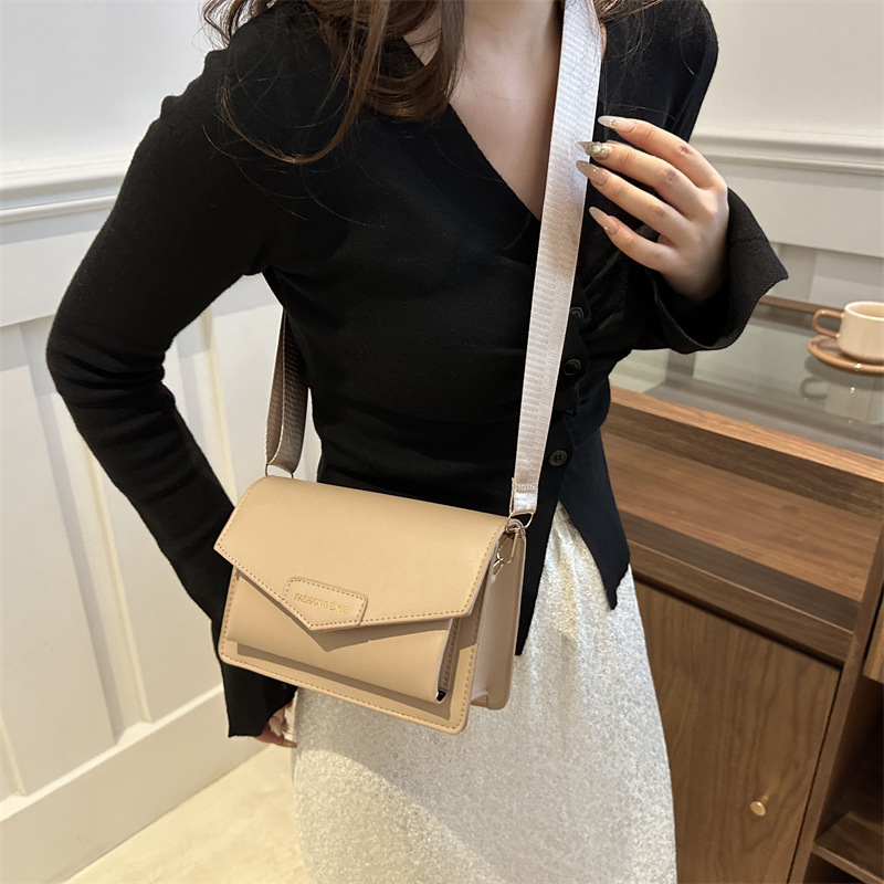 Calle casualidad de color sólido bolso de hombro 2024 nuevo tipo de bolso de mano casualidad nueva moda simple bolso de hombro