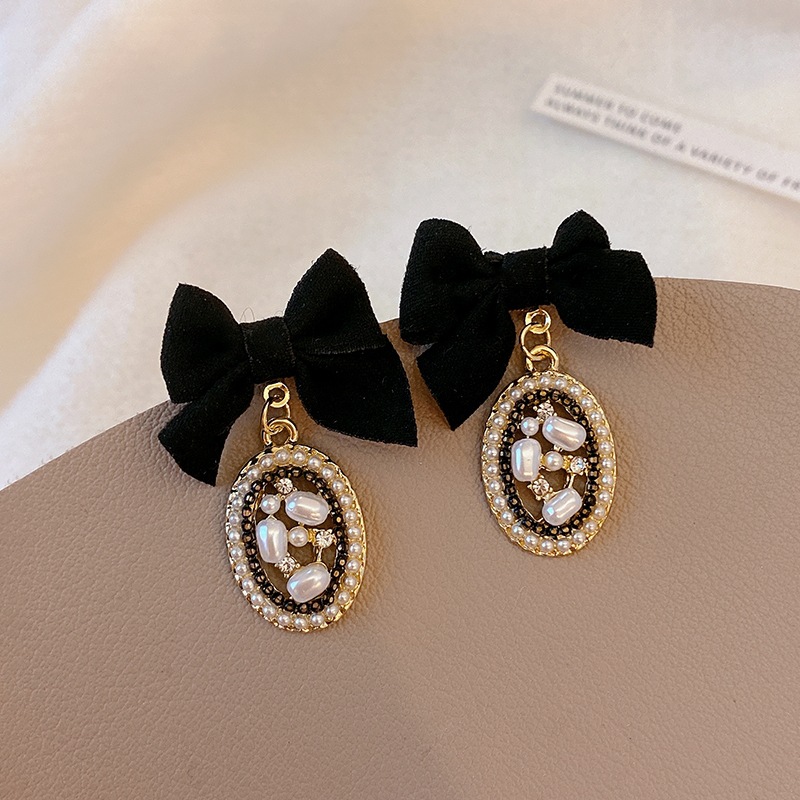 Elegant Bow Knot Inlay Alloy Pearl Drop Earrings display picture 1