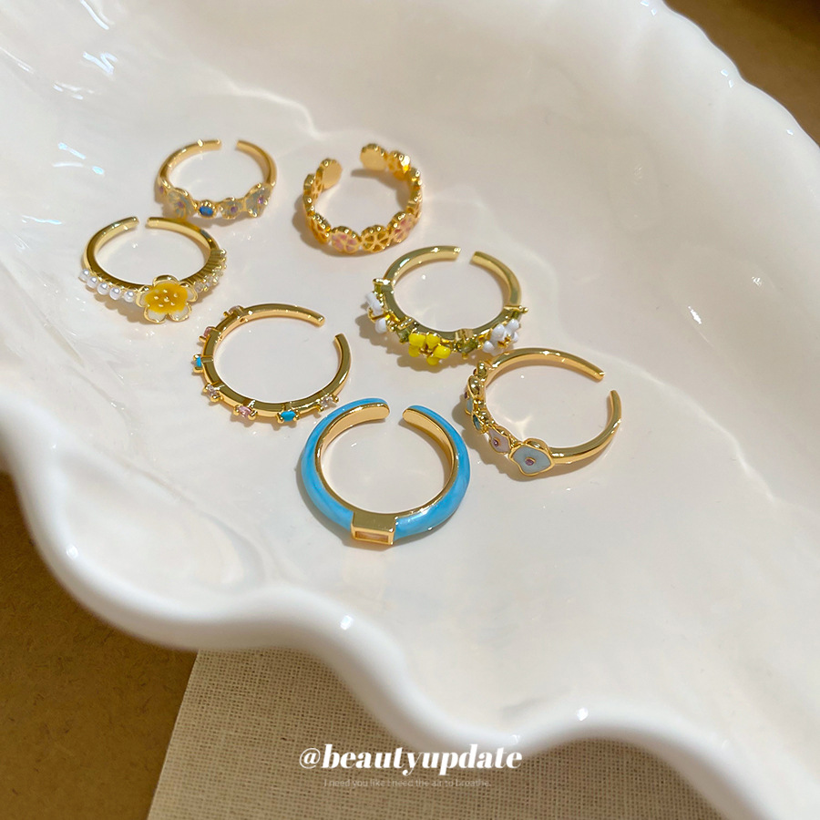 Bague pour femme, plaquée or véritable, ornée d'une goutte d'huile et d'un zircon en forme de fleur, style palais ouvert, pour l'index. Un bijou léger, luxueux et raffiné._voghion.com