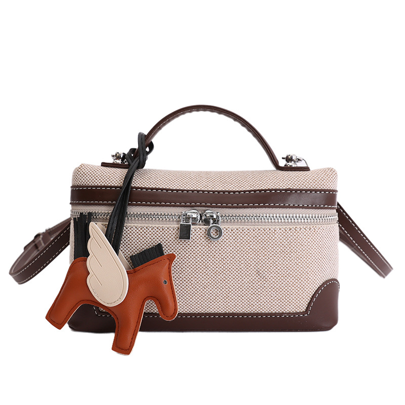 Caja de mano retro europea y americana bolsos pequeños cuadrados para mujeres nuevas ventas calientes de lona transfronteriza color de empalme de hombro único