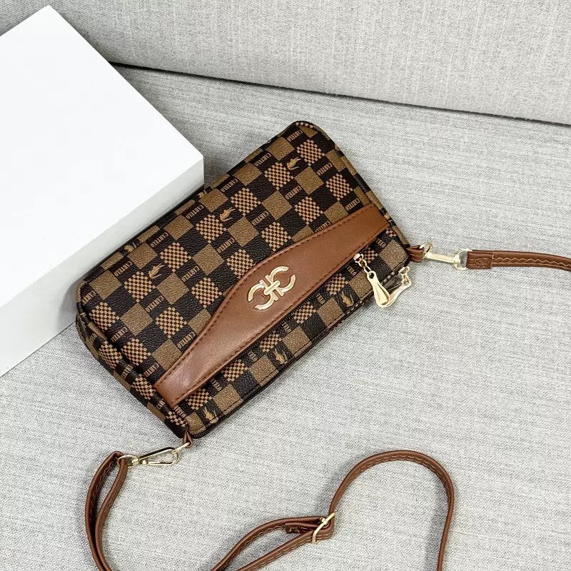 Guangzhou Hengli 2024 nuevo bolso de mensajero transfronterizo bolso casual de mediana edad bolso de teléfono móvil para mujer bolso de venta caliente bolso de hombro