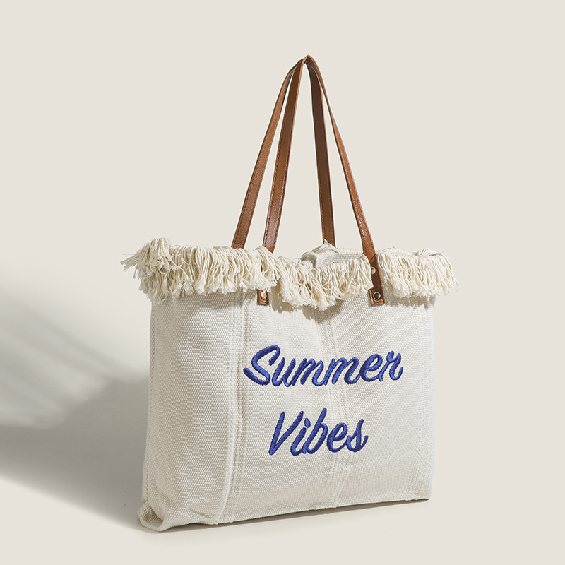 여성을위한 대외 무역 가방 2024 새로운 다목적 술 자수 토트 백 대용량 한국 스타일 패션 간단한 핸드백