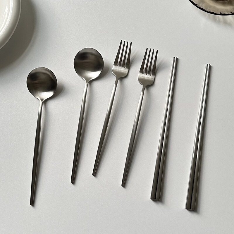 European-Style Portuguese 304 Stainless Steel Spoon, Chopsticks, and Knife Set with a Wave Pattern and Full Sandblasted Silver Finish European-Style Portuguese 304 Stainless Steel Spoon, Chopsticks, and Knife Set with a Wave Pattern and Full Sandblasted Silver Finish