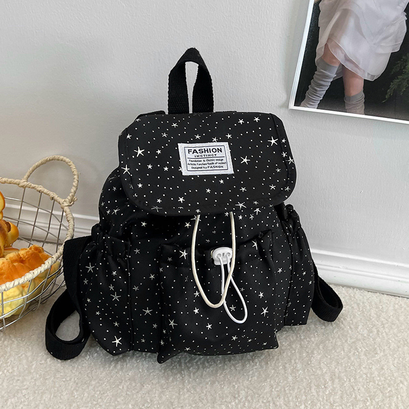 Primavera nuevo estilo ins leche de viento bonito joven estrella impresa mochila de hombro para mujeres de alto valor dulce mochila pequeña