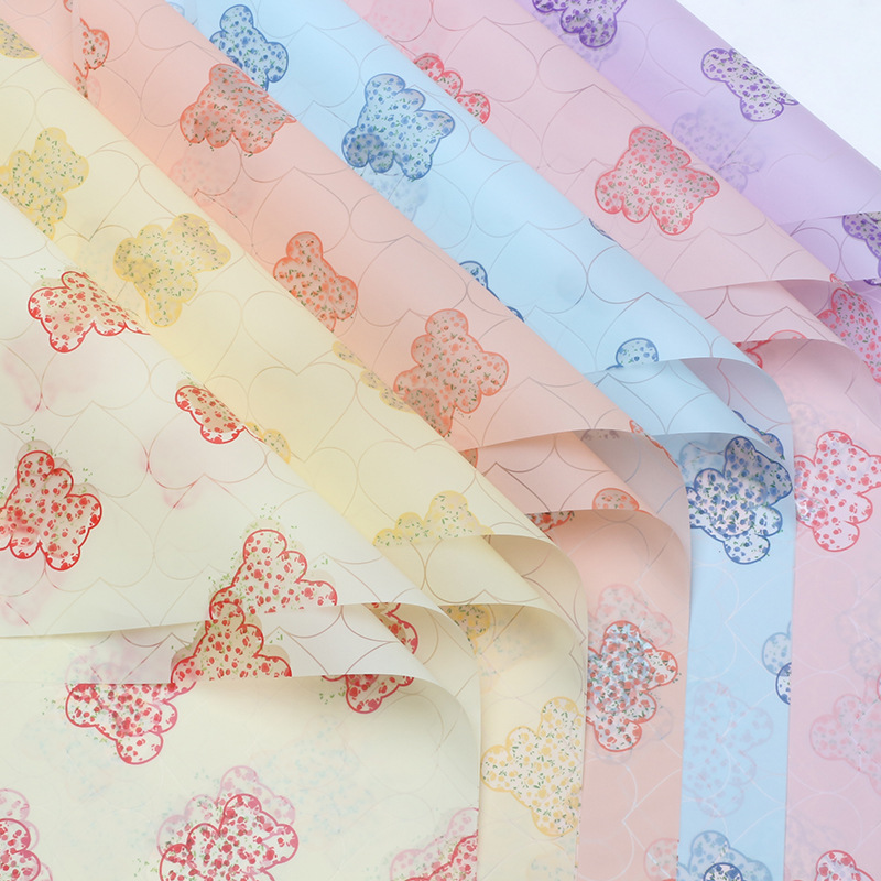 Huaxi Jardín Bear Jelly película de flores papel de embalaje comercio exterior transfronterizo ramo florista al por mayor papel de embalaje de flores