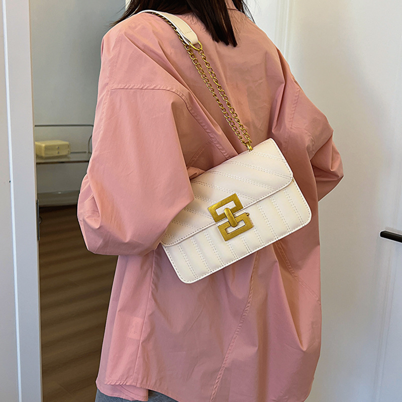 Primavera retro bolsos de mujer 2024 nuevo popular explosivo bolso de cinturón de cadena de moda bolso de hombro