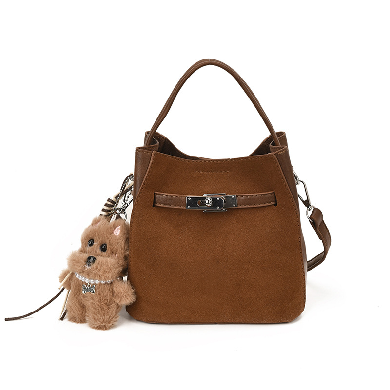 Bolsa de mano coreana retro de tería para mujeres 2025 nuevo tipo de bolso casual versátil, bolso de cubo de viaje de alta calidad