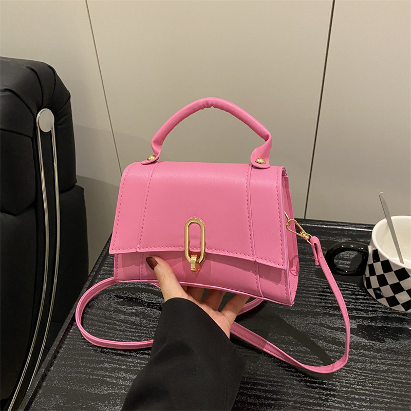 Bolso de mano coreano 2025 primavera nueva bolsa de moda de mujer con bloqueo de moda bolso de hombro simple de viaje