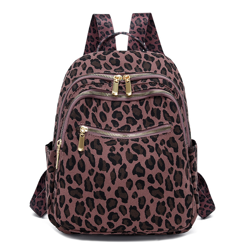 Mochila transfronteriza con estampado de leopardo súper fuego para mujer 2024 nuevo estilo salvaje para mujer mochila casual de gran capacidad bolso de viaje de moda