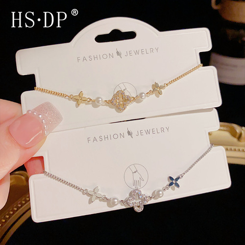 Internet celebrity style, fashionable and elegant, delicate micro-inlaid hollowed-out four-leaf clover bracelet for women, sweet and luxurious all-match bracelet