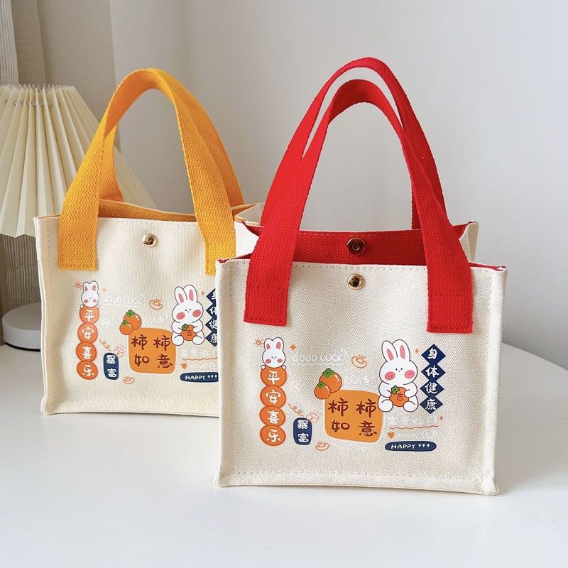 New canvas bag, Shishi Ruyi handbag, small square bag, fashionable, casual and cute bento bag, handbag, hand-held bag Application Scenario