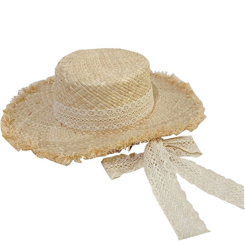 Cappello da sole in paglia per donna con fiocco e tesa larga_voghion.com