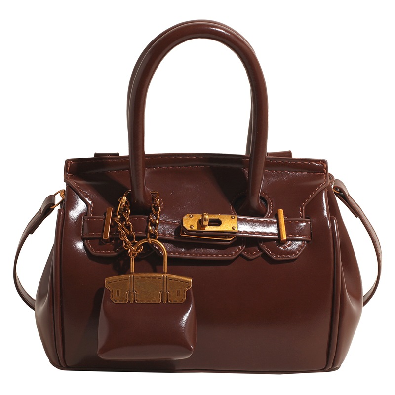 Bolso para mujeres 2025 nuevo cross-border multifuncional retro mochila de hombro nicho bolso de oro de lujo ligero
