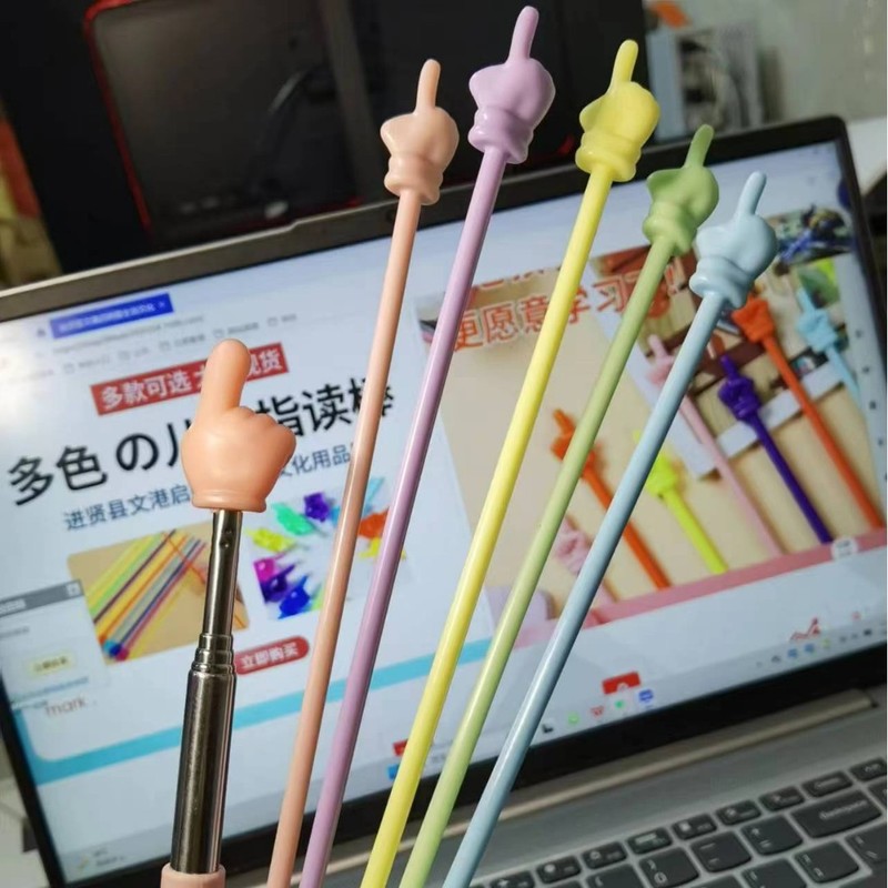 子供の読書は本を読んで伸縮して棒の指を読むことができます。|undefined