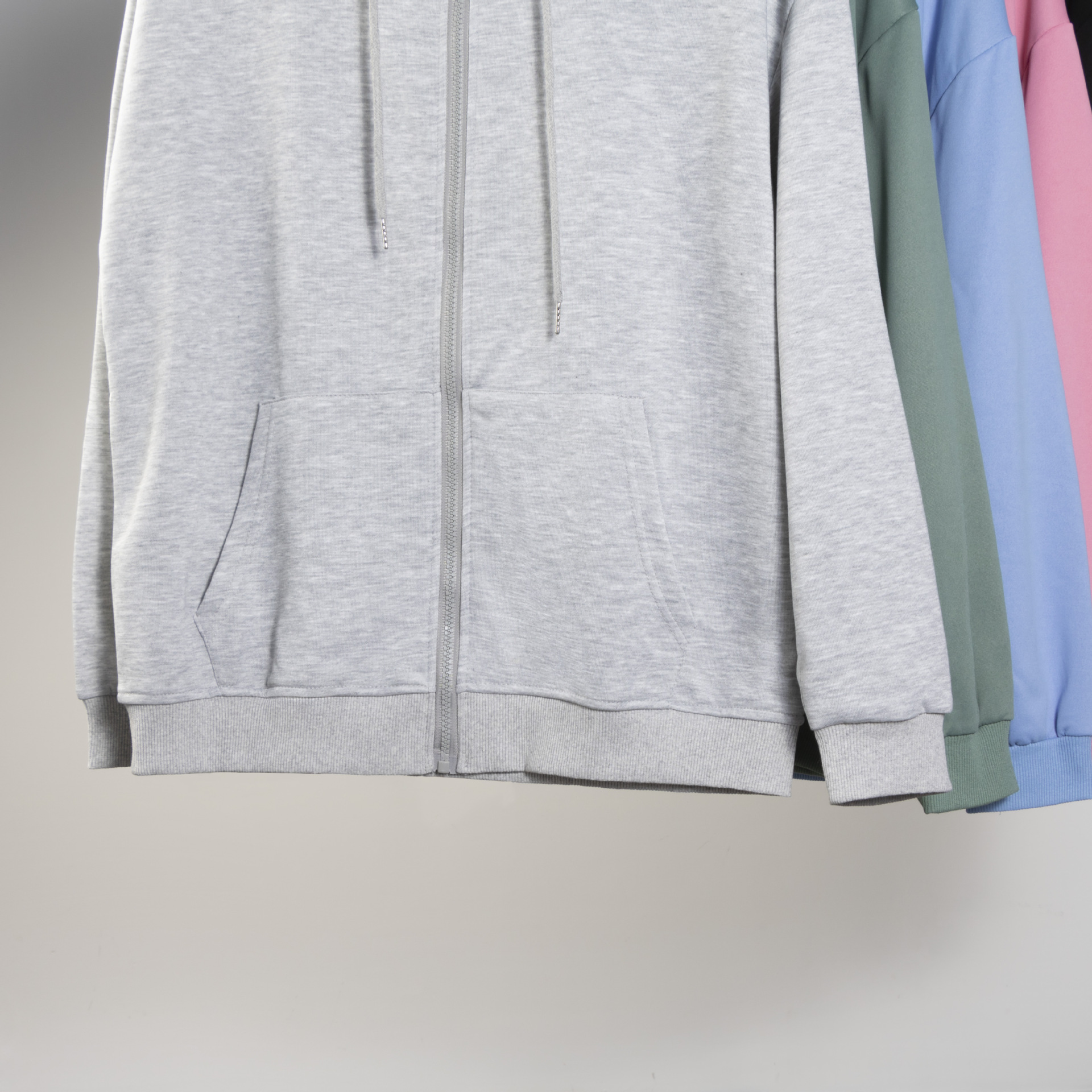 Primavera y otoño cárdigan con cremallera y capucha sudadera fuera del hombro de manga larga color puro Xiyin transfronterizo Temu versión suelta