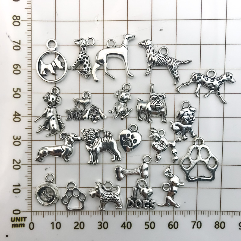 Venta caliente de fábrica 1 caniche plata Xizanga accesorios colgante DIY accesorios animales antiguos plata cachorro hueso pata