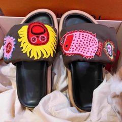 厚い底の太っているソファーのサンダルの草の間の弥生の夏の新型のお父さんの刺繍のスリッパは百合外にビーチの靴の女性の潮を着ます。