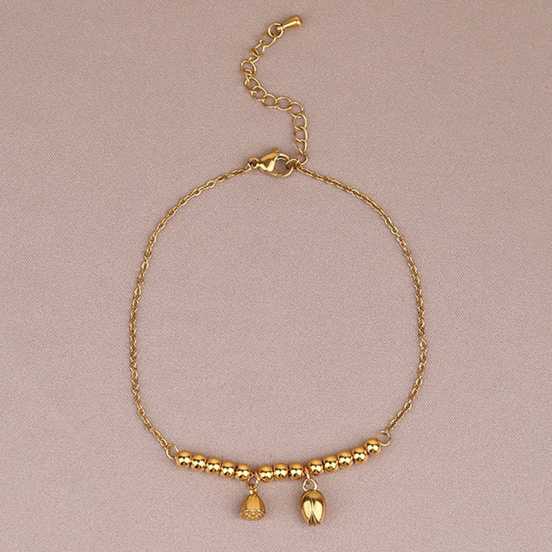 Tobillera de loto dorado