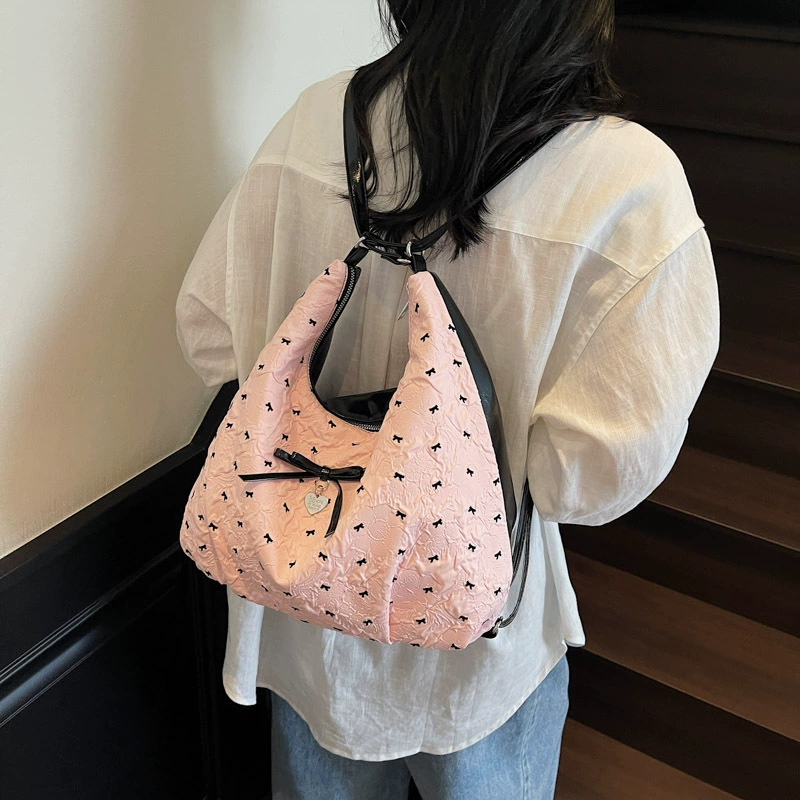 Capacious shoulder bag with bow, backpack