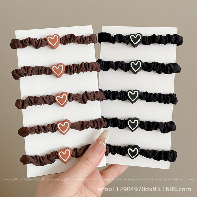 2025 nuevo estilo simple cabello de moda de alta elasticidad correa de correa de cabello multifuncional cubierta de cuero durable cabello bola adornamiento para el cabello