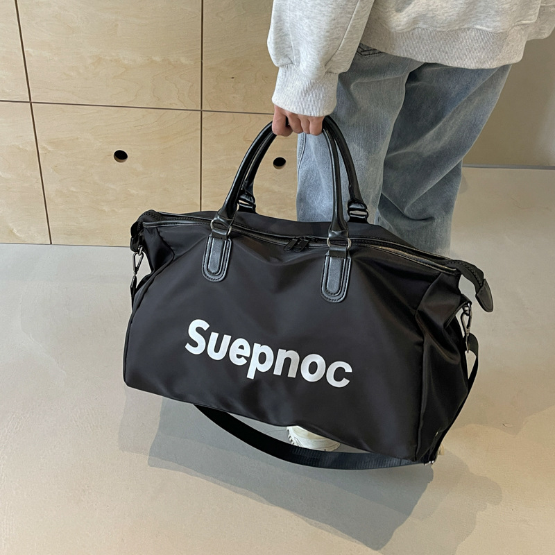 Bolso de viaje de corta distancia de gran capacidad de sensación de alta calidad Bolso de equipaje de almacenamiento portátil impreso de moda Bolso de gimnasio de mensajero de hombro para mujer