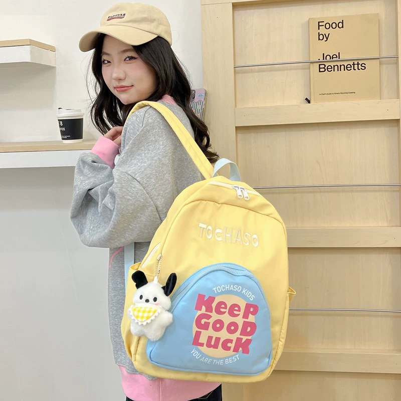 Big school bag with letters, capacious high quality backpack, simple and elegant design