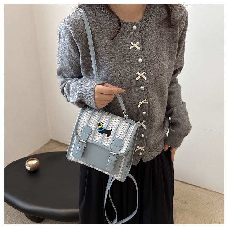 The new backpack for the autumn of 2024 is a fashionable and simple hand-held student single-shoulder bag with a checkered lid and a retro crossbody style undefined