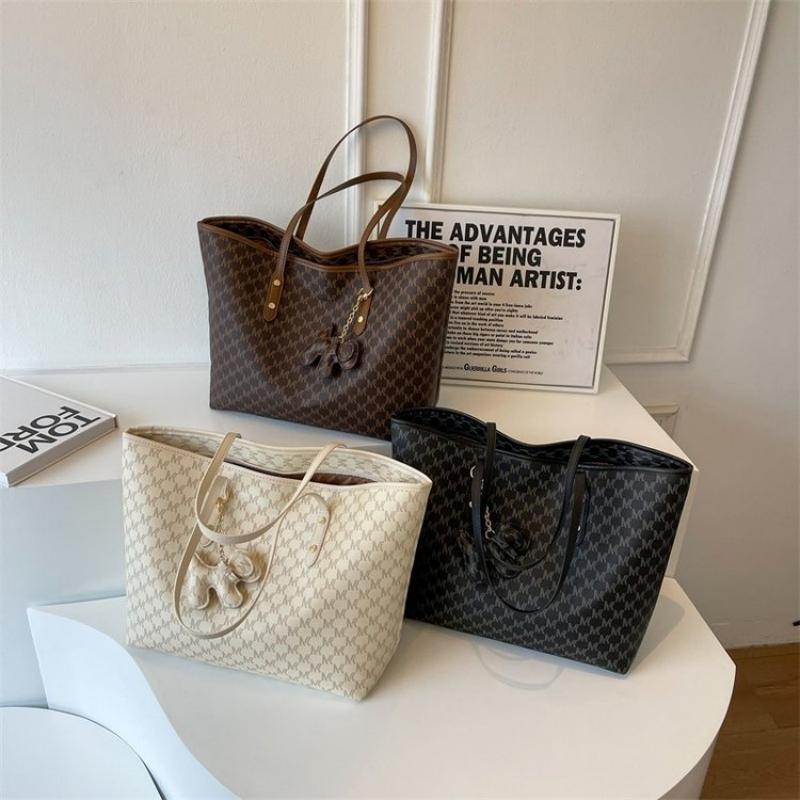 Bolso de alta sensación para mujeres 2025, nuevo tipo de bolso de mano, bolso de viaje de moda universal, bolso de hombro de gran capacidad