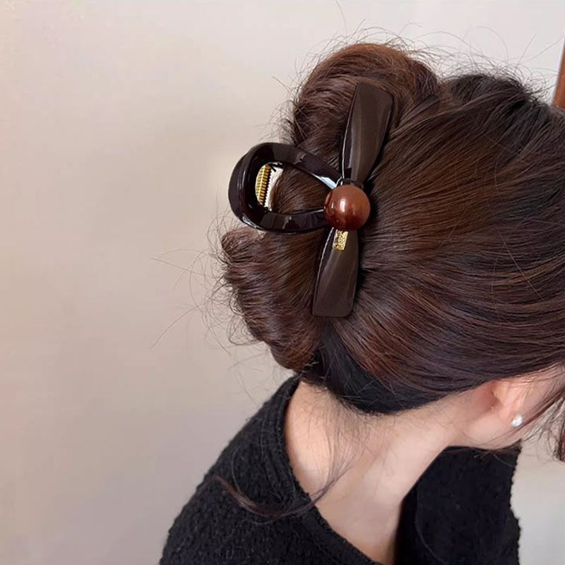 Diseño ~ principios de primavera de alta gama oro etiqueta clip de agarre para mujeres 2025 nuevo estilo de alta calidad clip de tiburón clip de cabello detrás de la cabeza