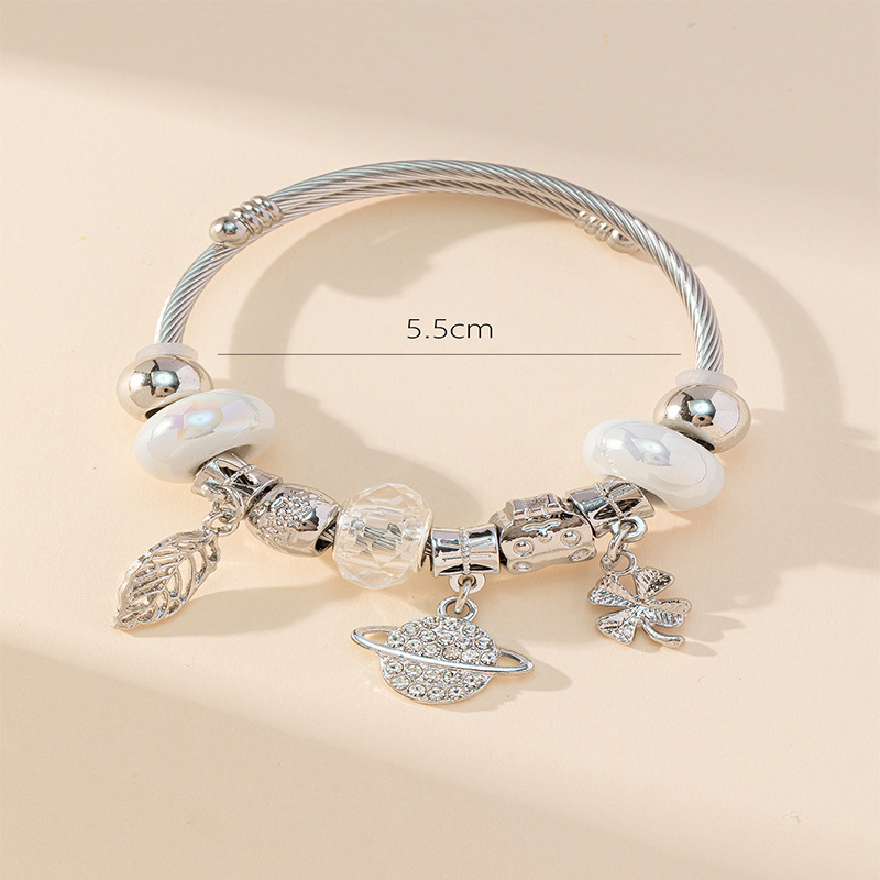 Panjia pulsera Dora DIY cuentas transfronterizas explosión oso accesorios de aleación colgante de hojas de Saturno brazalete abierto
