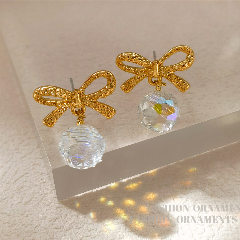 Copper earrings with bow drop-shaped