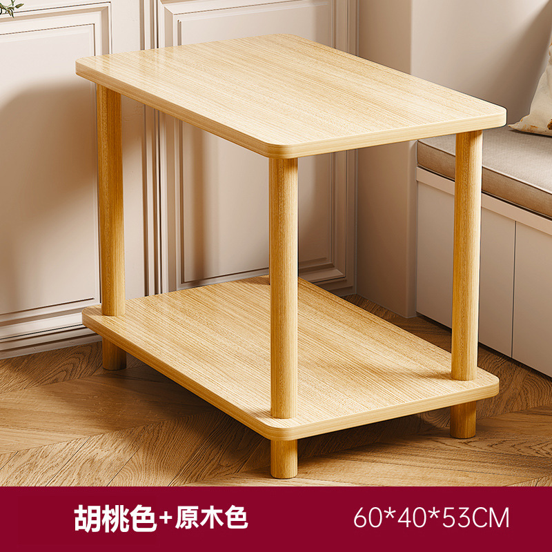 小さいテーブルのソファーの辺のいくつかのお茶のいくつかの家庭は移動することができます。|undefined