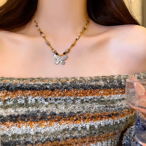 Bohemian-style butterfly necklace for women, featuring a new Chinese retro bead sweater vest chain, a niche temperament necklace.