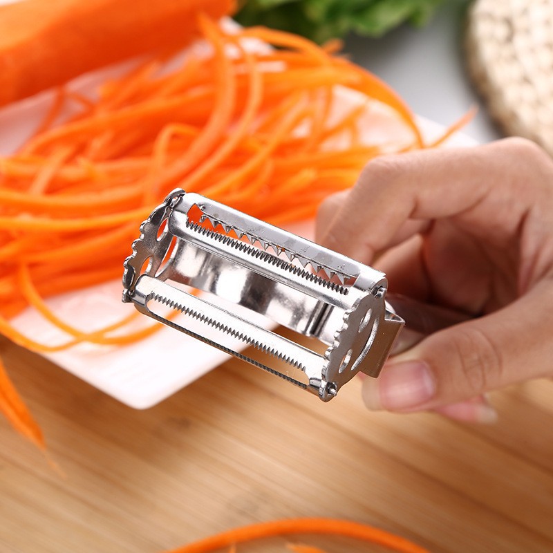 Fábrica al por mayor multifuncional Smiley cara de doble uso pelador hogar melón y fruta peeling cuchillo herramientas de cocina